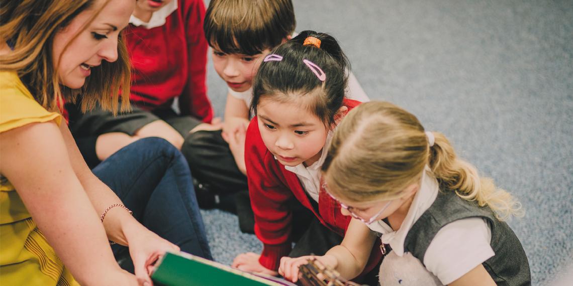 kids reading a bible in school