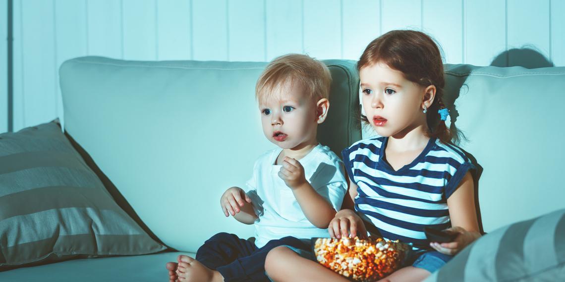 children watching a screen