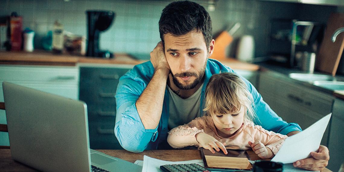 an unhappy man sitting with his child