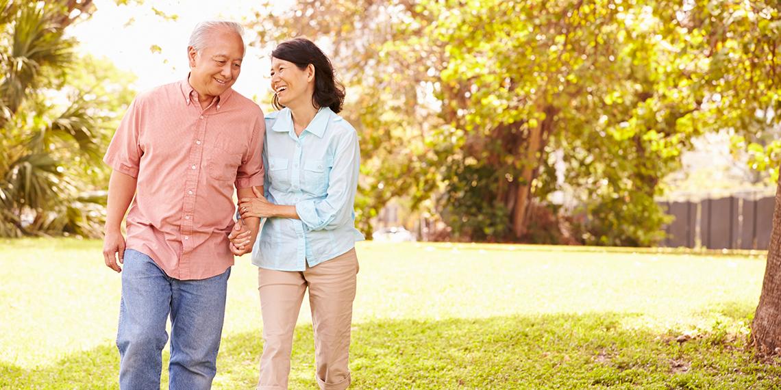 an old couple walking together