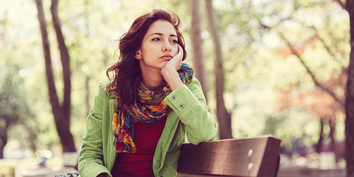 a woman looking wistful