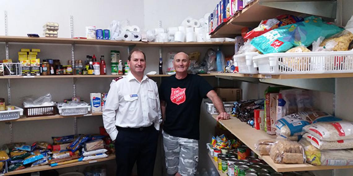 Staff from Nelson Community Ministries are loving donations from the Foodbank Project