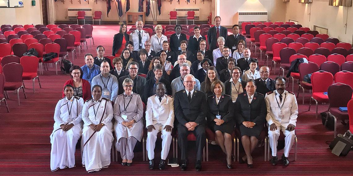 The General with Salvation Army officers and employees working in child protection.