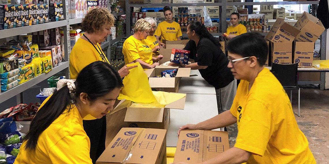 ASB team packing hampers