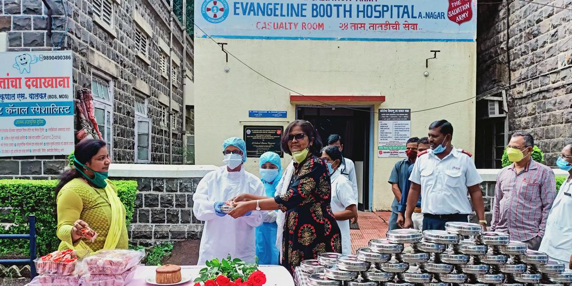 Staff outside Evangeline Booth Hospital